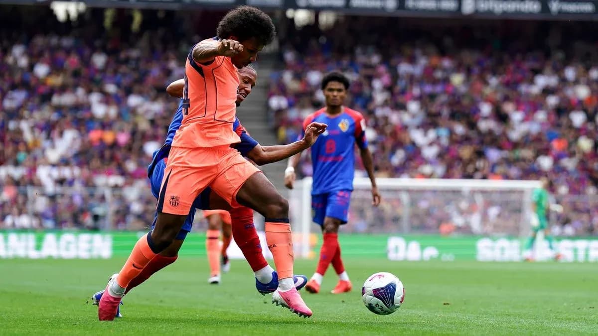 Player tackling opponent during football match action