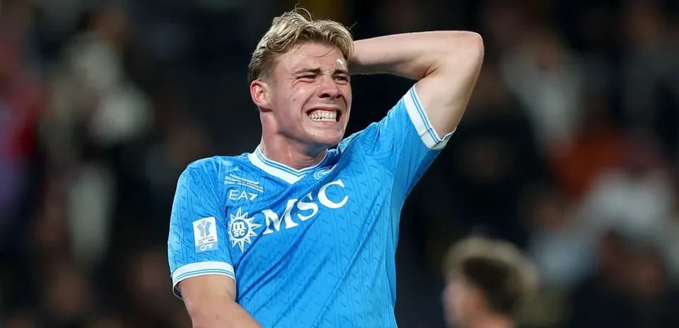 Player in blue jersey reacting during a match