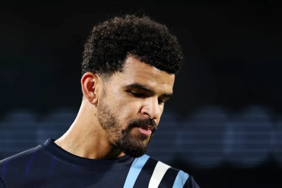 Player looking down during post-match interview