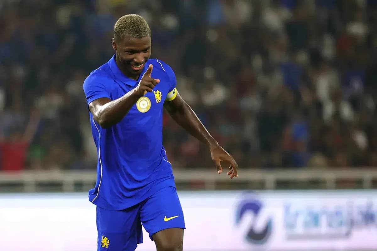 Player celebrating with a finger raised during match