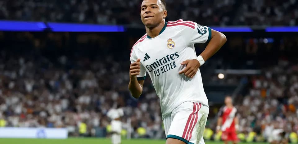 Player running during match in Real Madrid kit