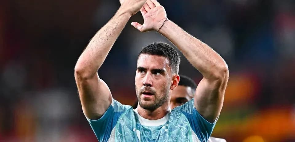 Player applauding fans after a match