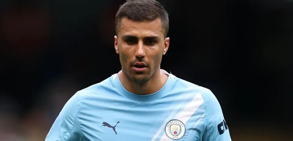 Player in Manchester City kit on the field
