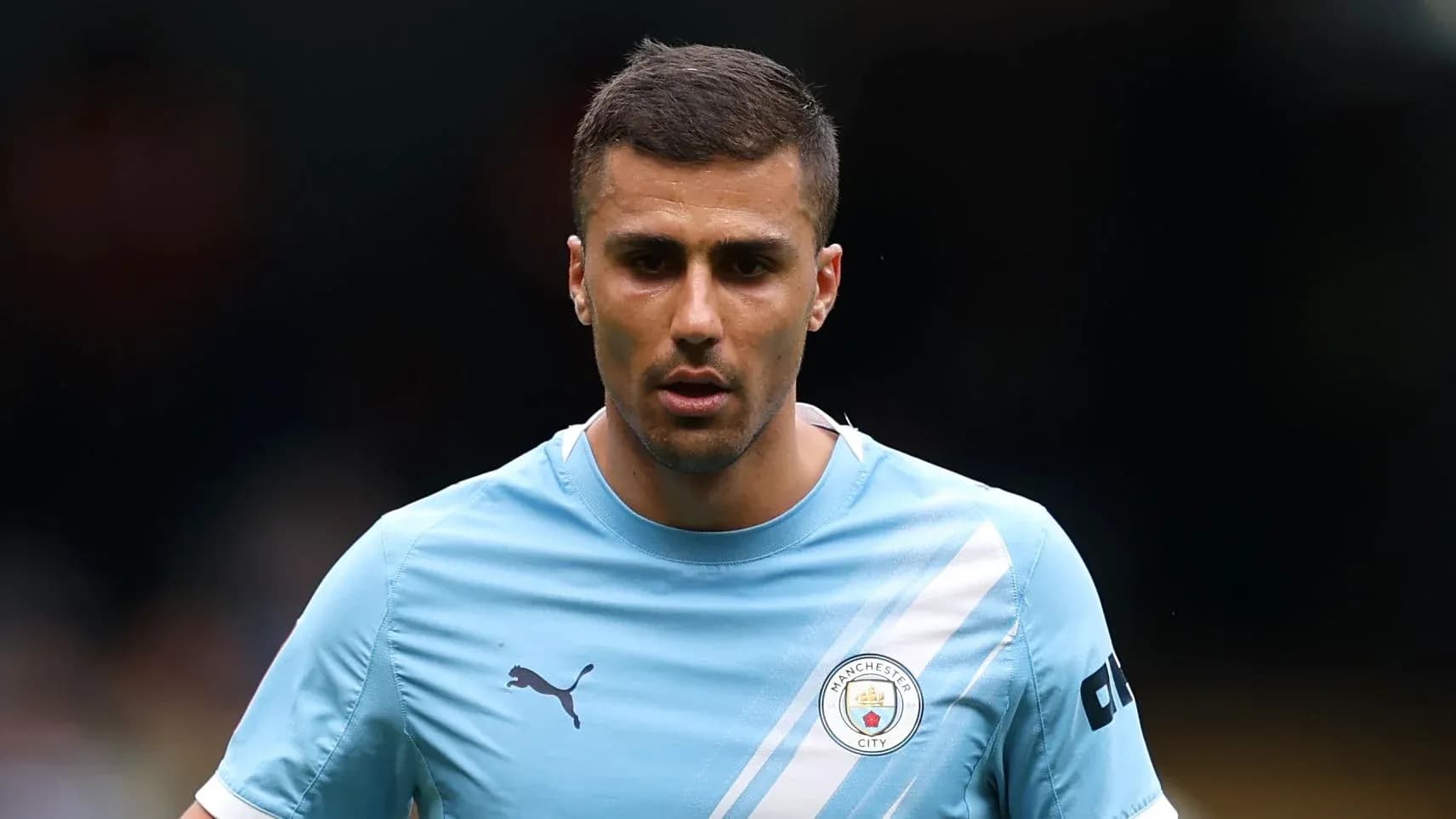 Player in Manchester City kit on the field