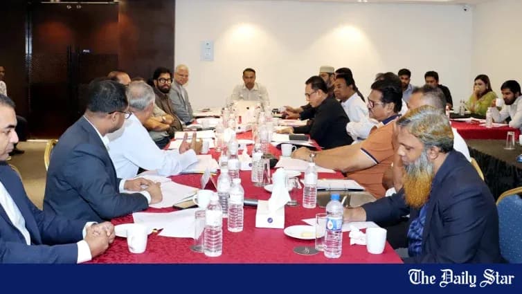 Meeting in progress around a conference table