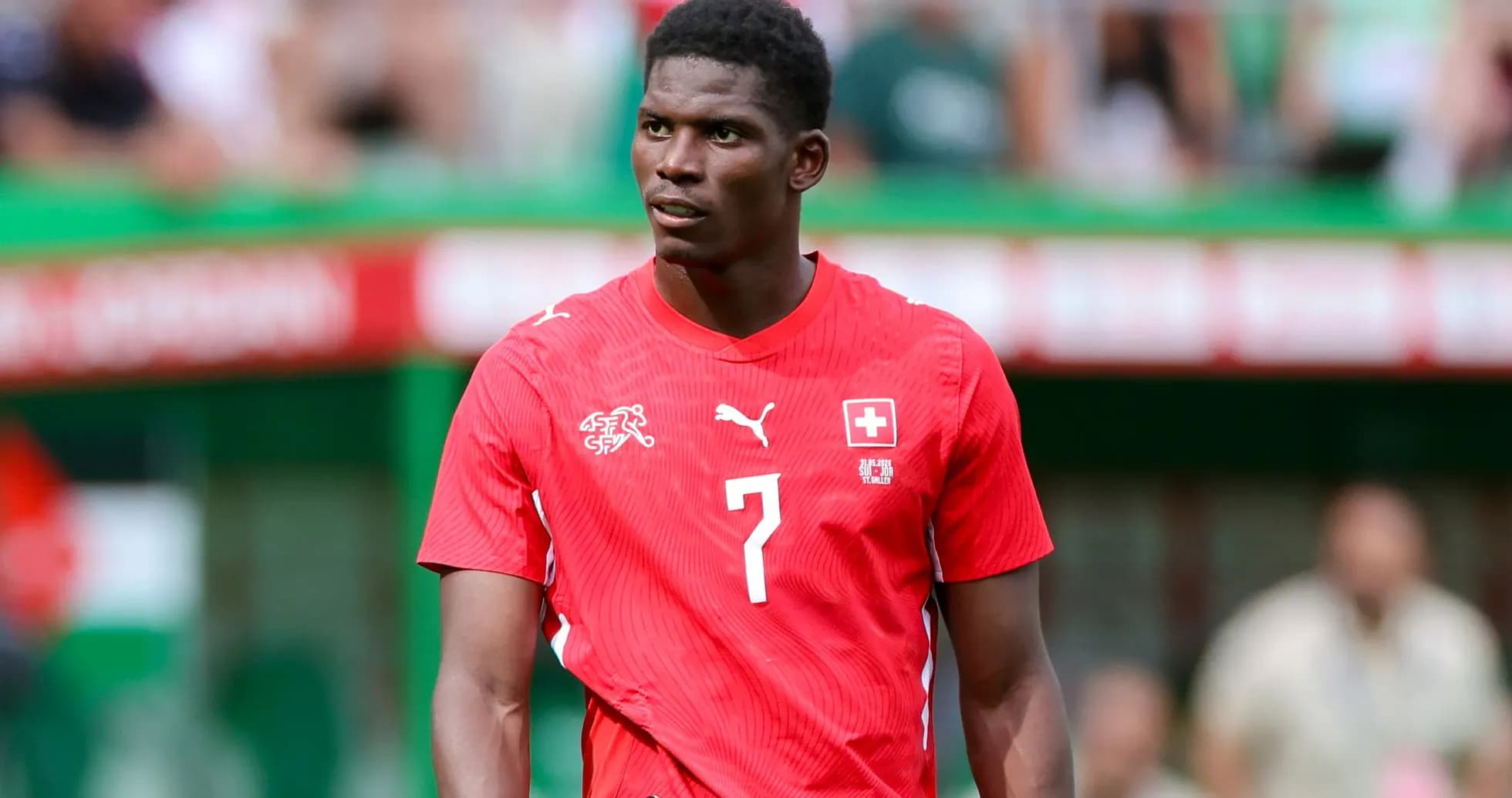 Player in red jersey during a football match