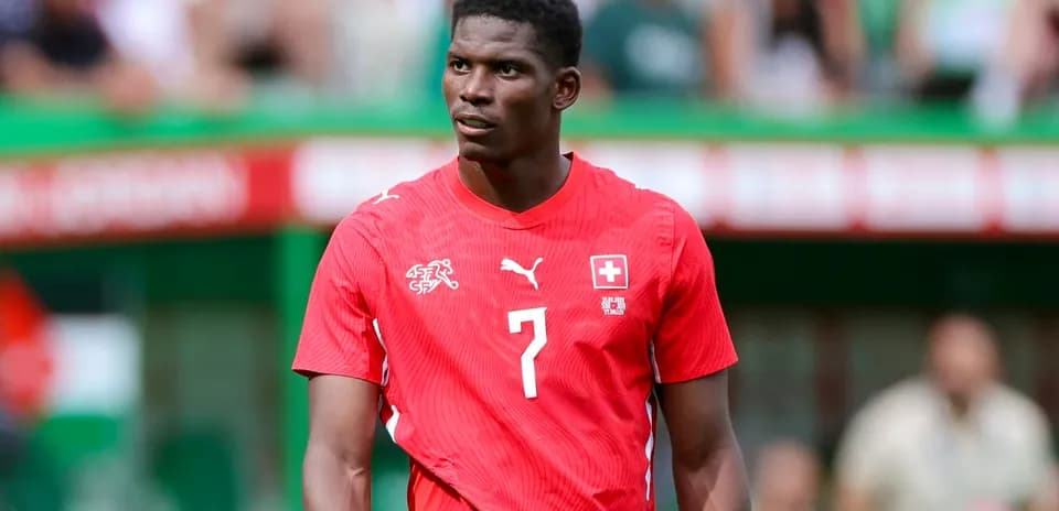 Player in red jersey during a football match
