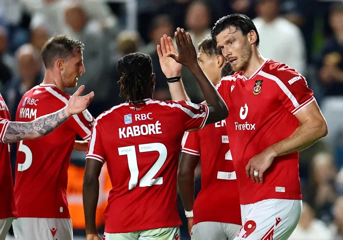 Players celebrating together after scoring a goal