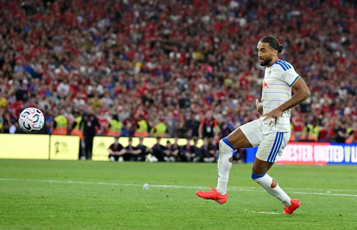 Player kicking the ball during a football match