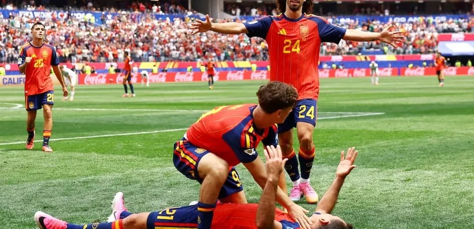 Spanish players celebrating a goal during match