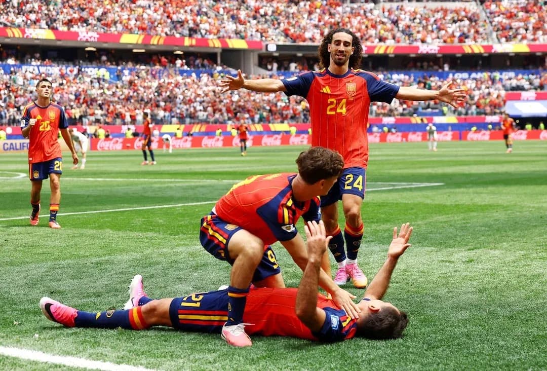 Spanish players celebrating a goal during match