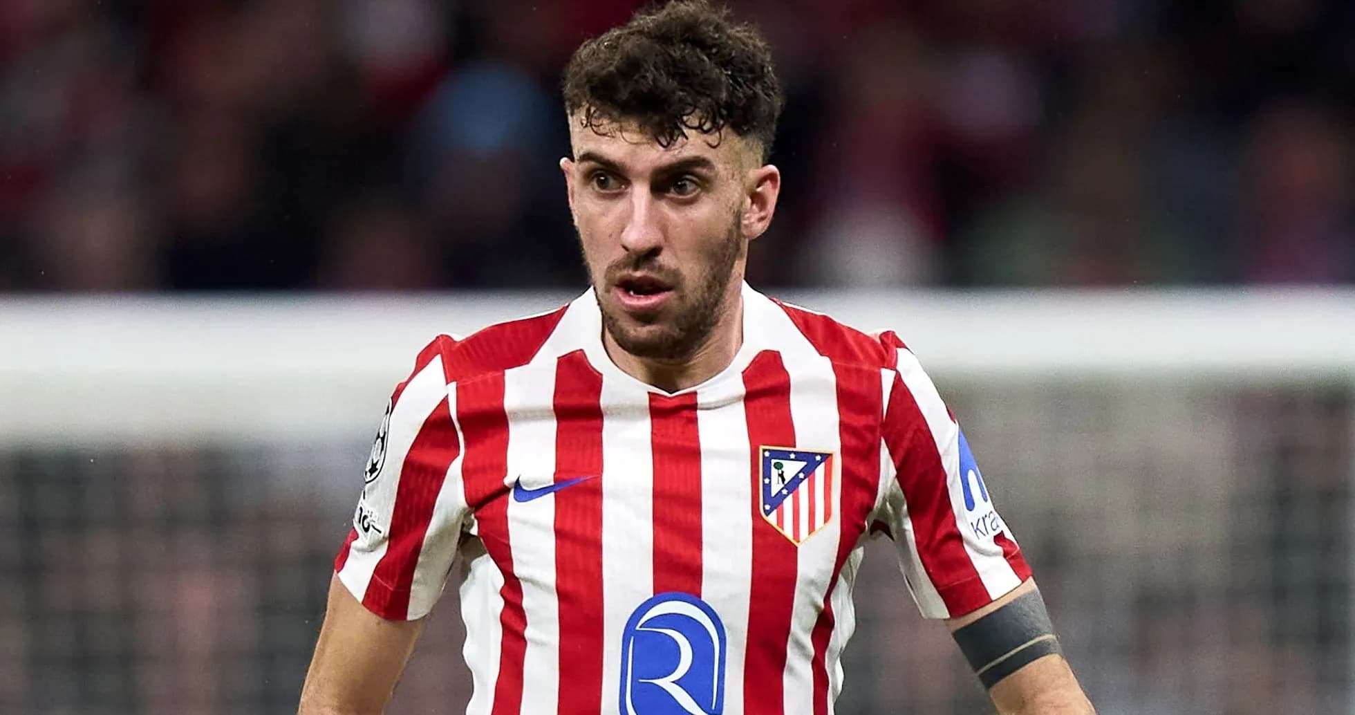 Player in Atlético Madrid jersey during match