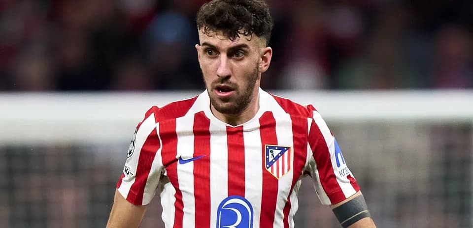 Player in Atlético Madrid jersey during match