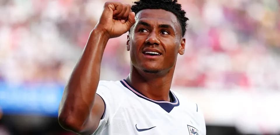 Player celebrating with raised fist in football match