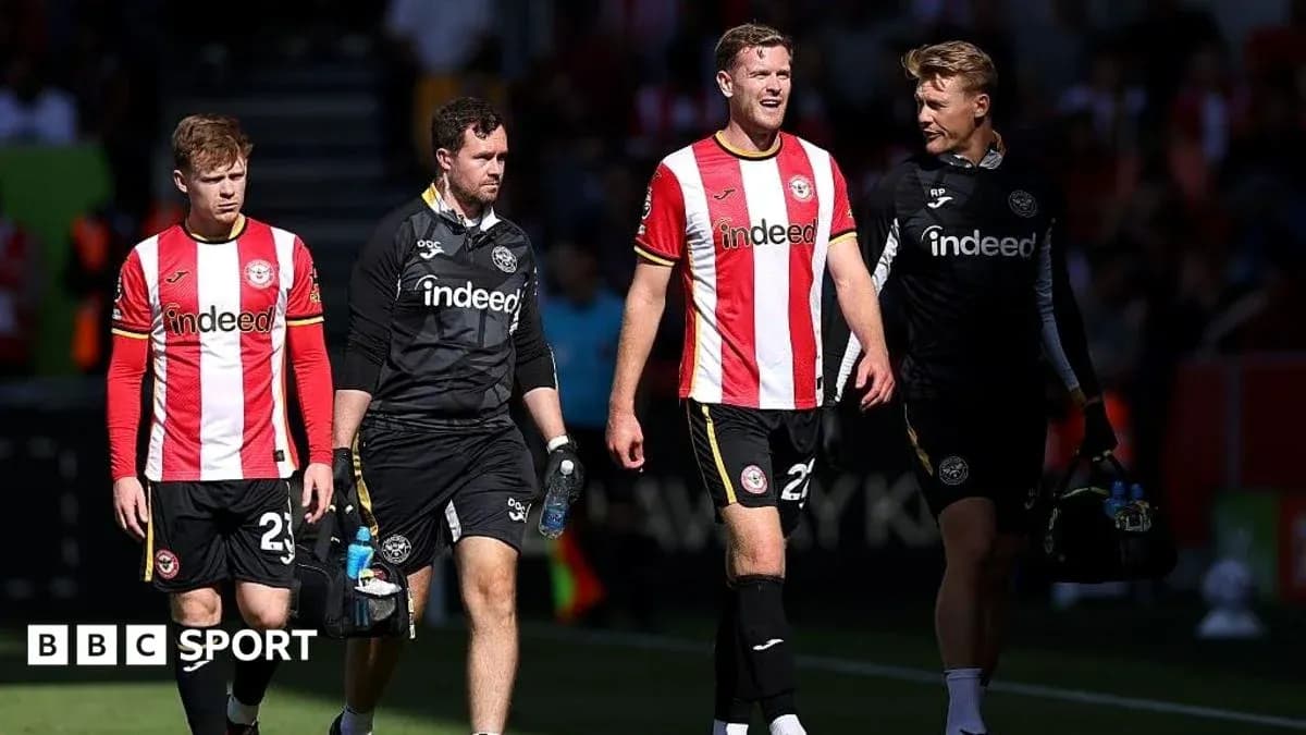 Brentford players walking off the pitch after match