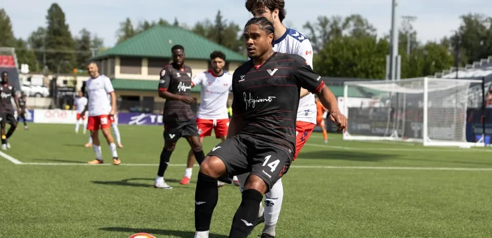 Player in action during Quebec vs Vancouver FC match