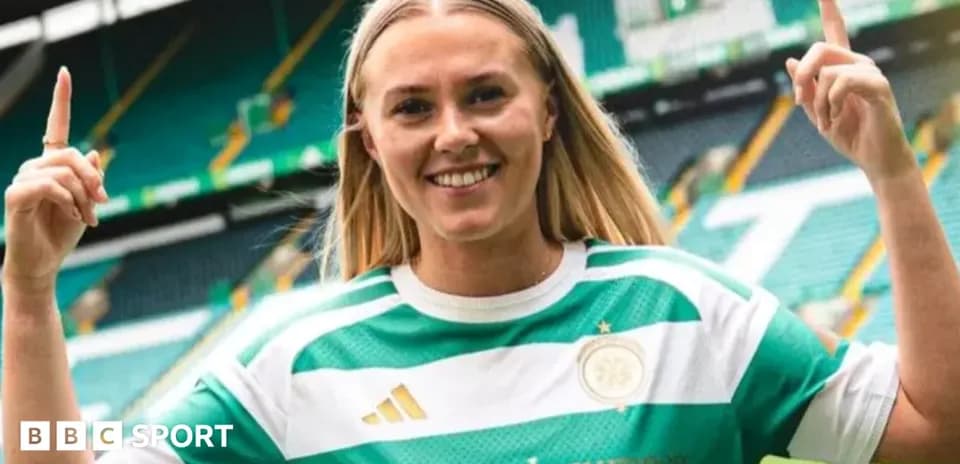 Player celebrating while wearing Celtic jersey