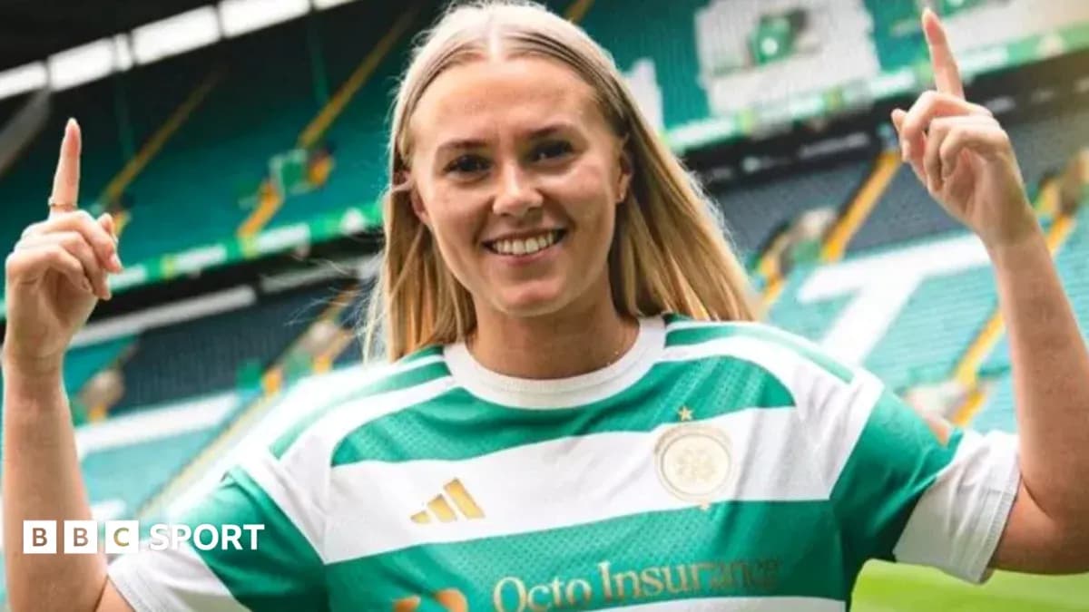 Player celebrating while wearing Celtic jersey
