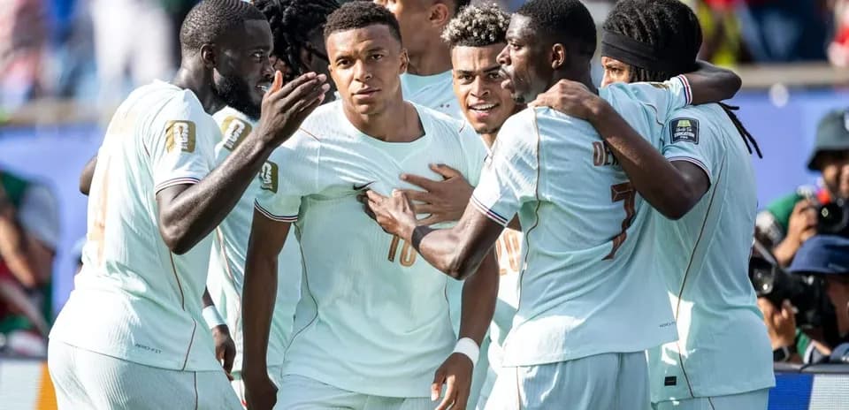 French team celebrating a goal on the field
