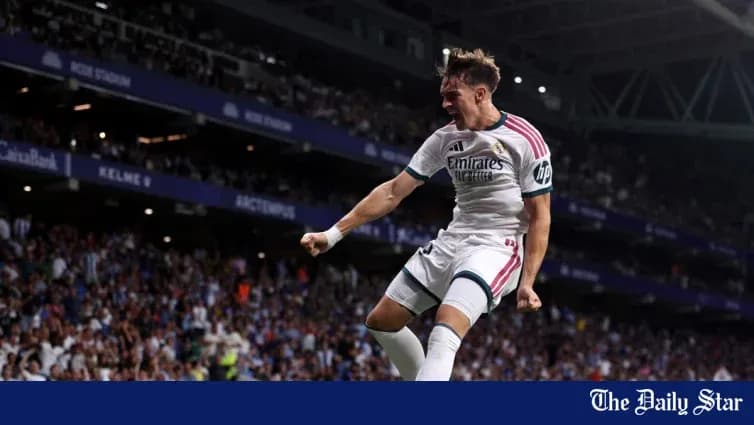 Player celebrating a goal at stadium
