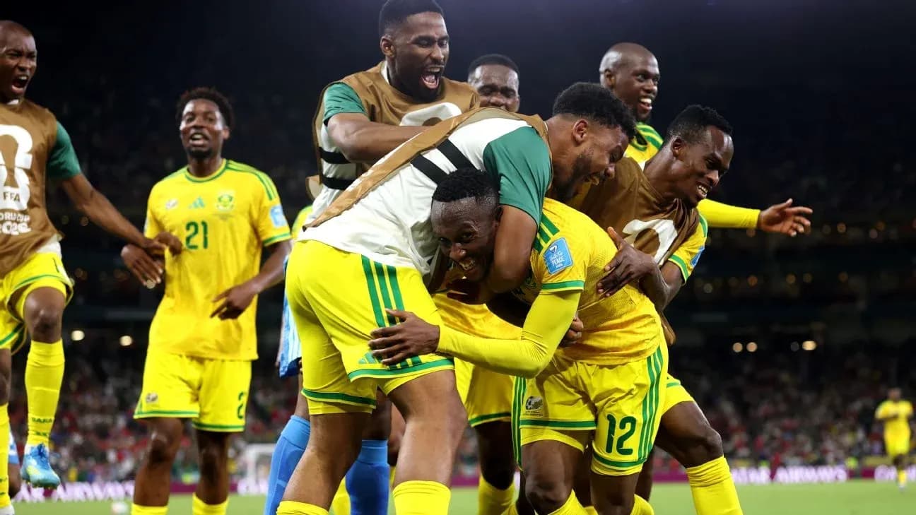 Players celebrating after scoring a goal in match