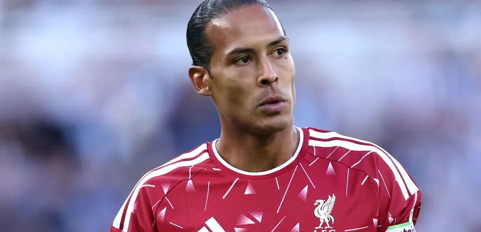 Player in Liverpool jersey during match preparation