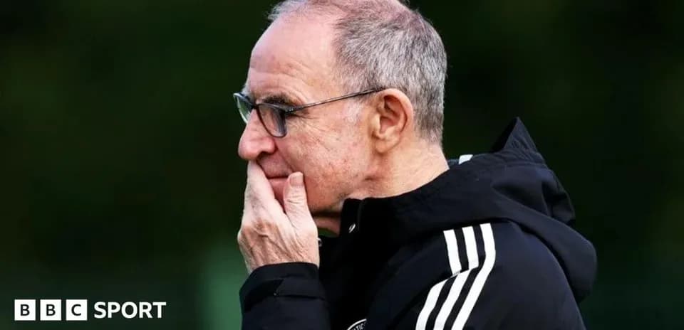 Manager observing during training session at pitch