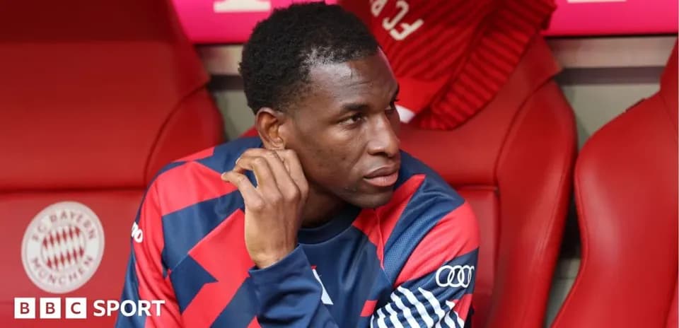 Player sitting on bench during match