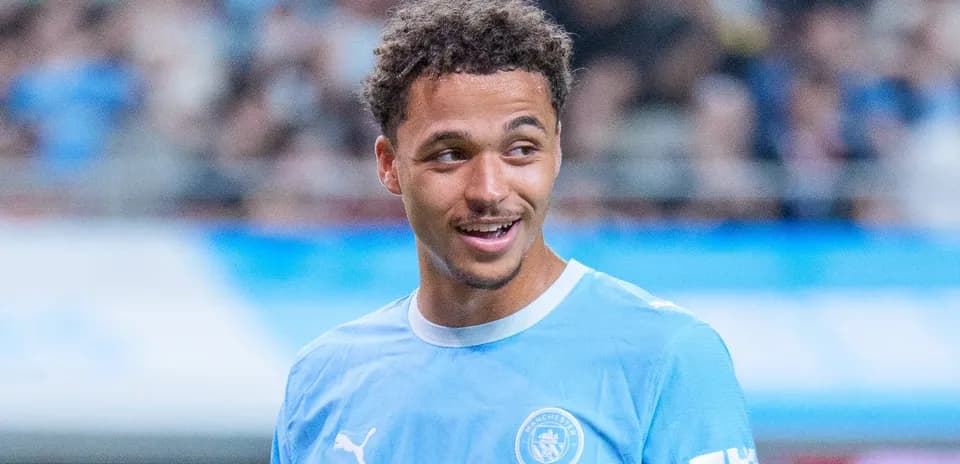Player in Manchester City kit during warm-up
