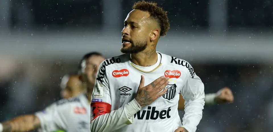 Player celebrating with hand on chest during match