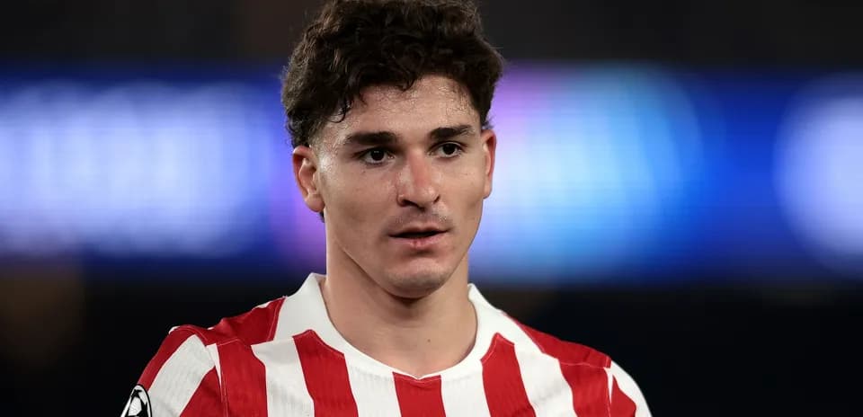Player in Atletico Madrid jersey during match