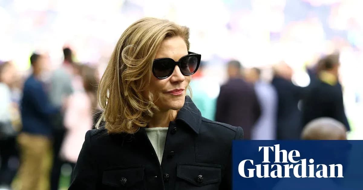 Woman wearing sunglasses at sporting event
