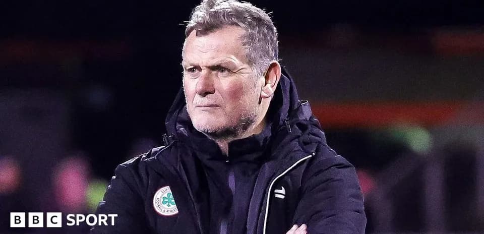 Coach observing the game from the sidelines
