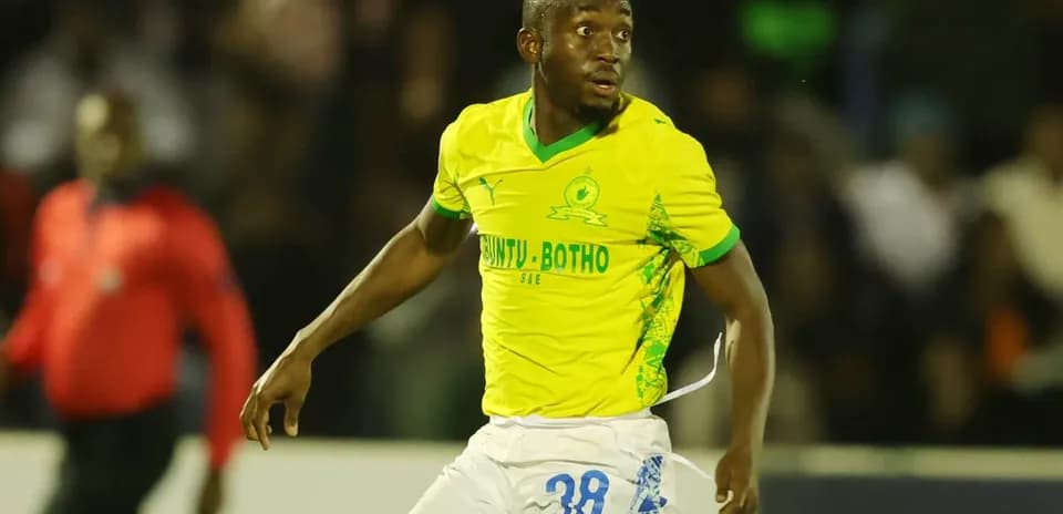Player in yellow jersey during a football match