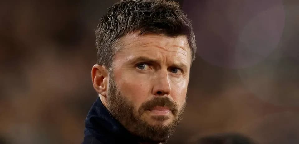Coach observing the match from the sidelines