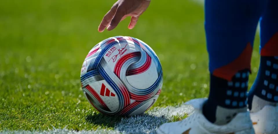 Player preparing to kick the soccer ball