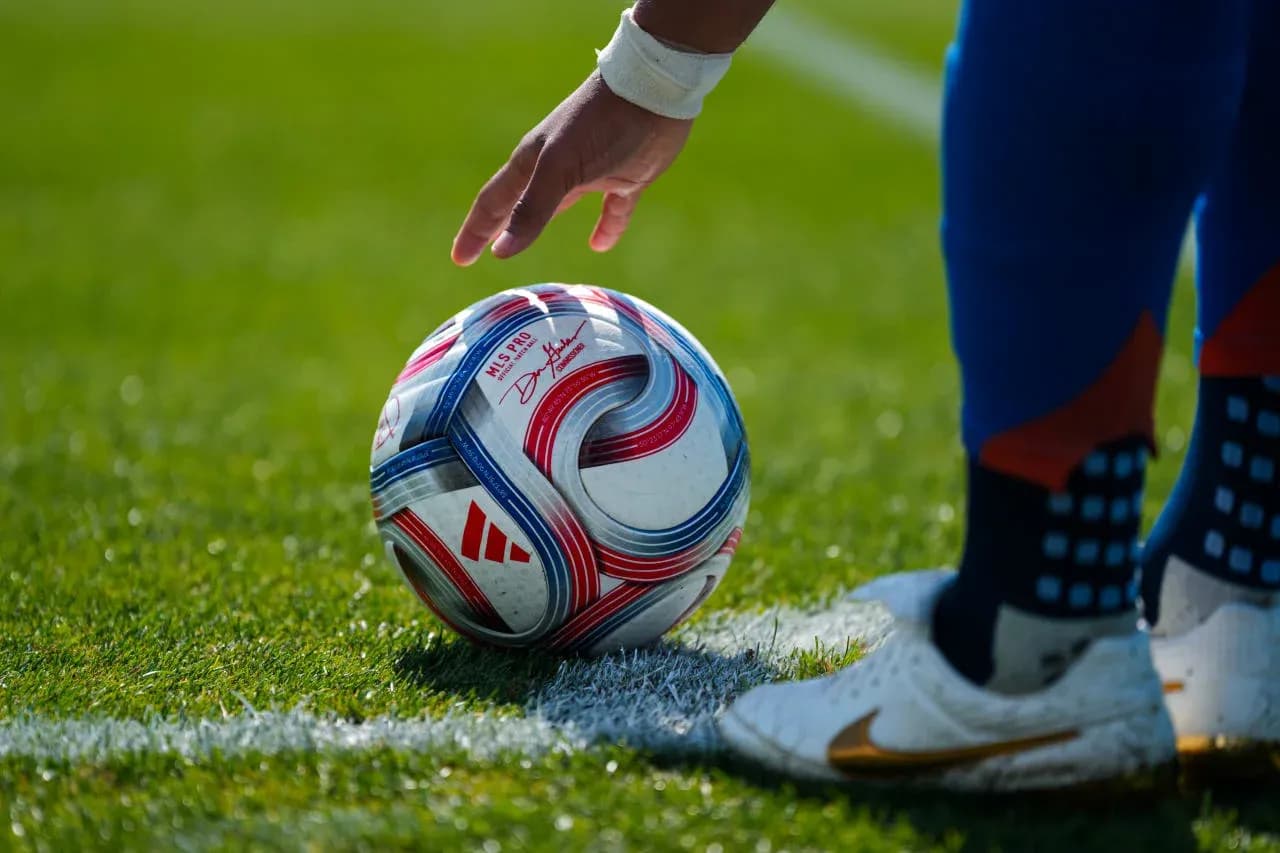 Player preparing to kick the soccer ball