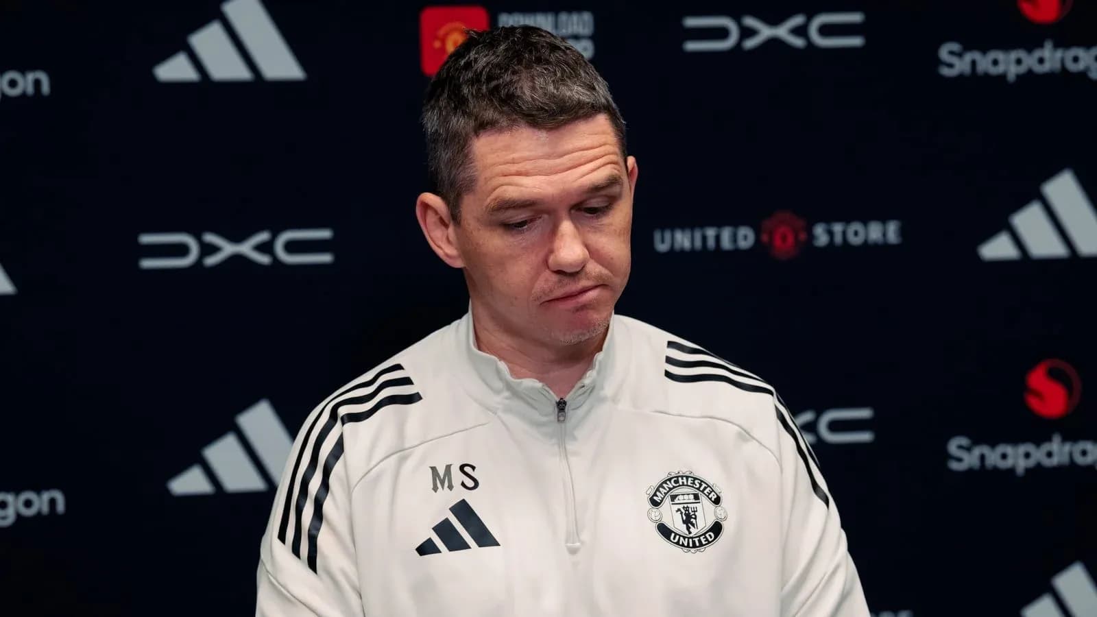 Manchester United manager at press conference table