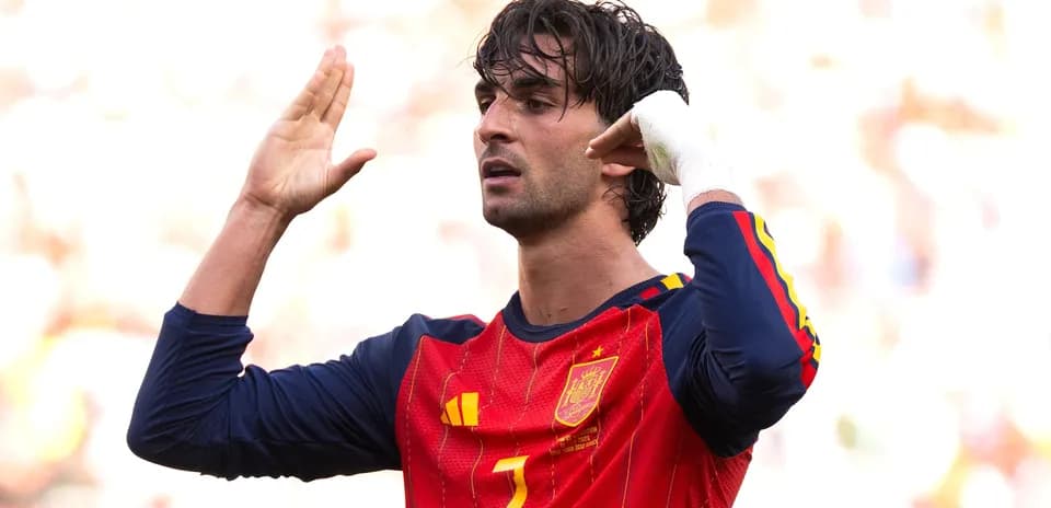 Player gesturing during match in Spain kit