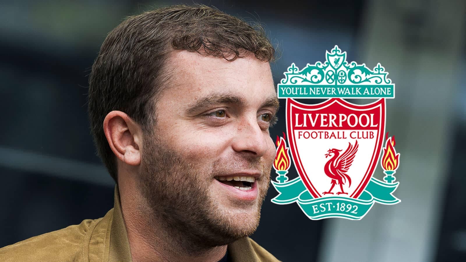 Person smiling next to Liverpool FC club logo
