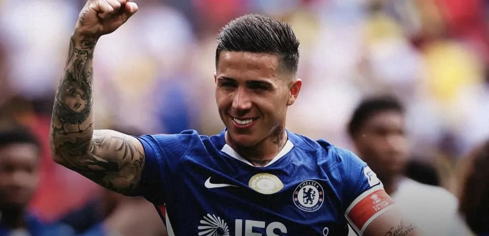 Player celebrating in Chelsea jersey after match