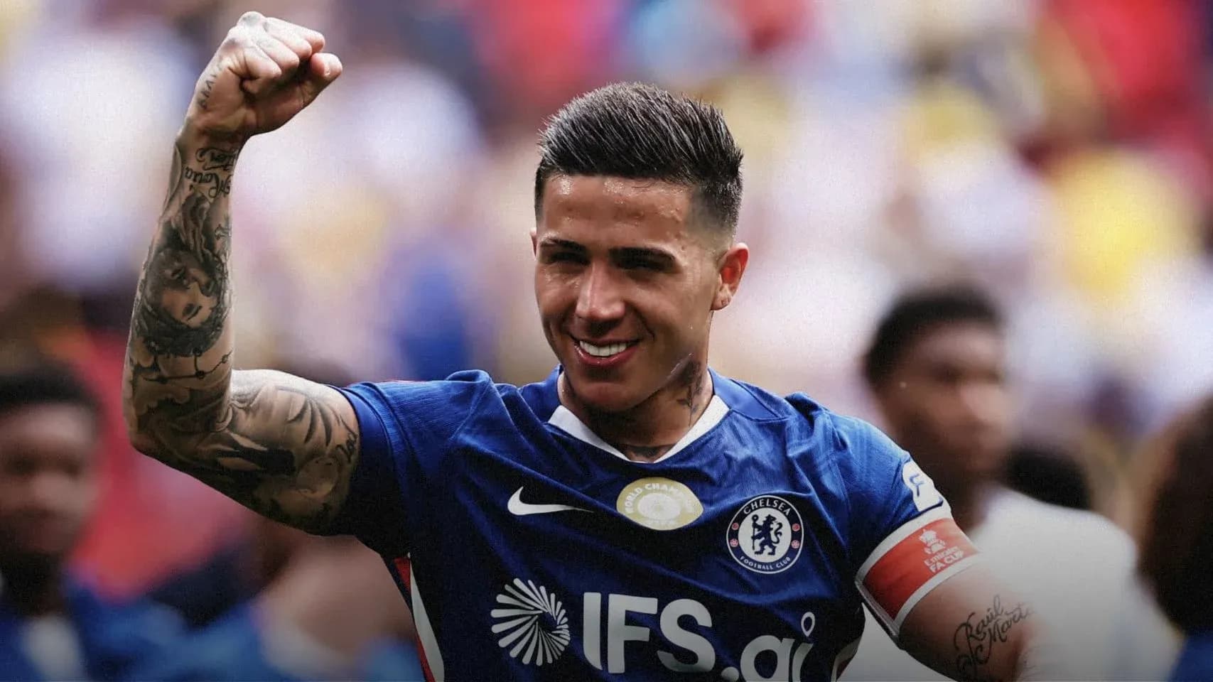 Player celebrating in Chelsea jersey after match