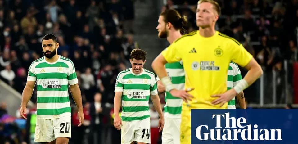 Celtic FC players walking off after defeat