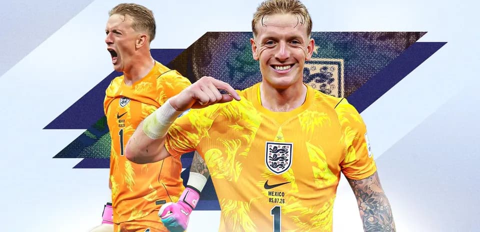 Goalkeeper in yellow jersey celebrating with fans