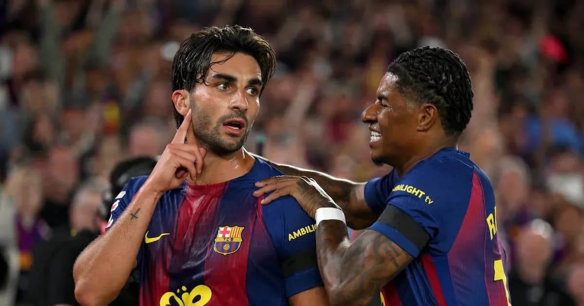 Barcelona players celebrating a goal on the field