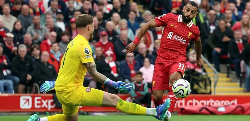 Liverpool player shoots at goal against Brentford