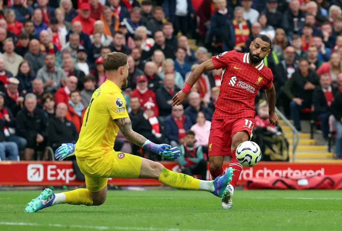 Liverpool player shoots at goal against Brentford