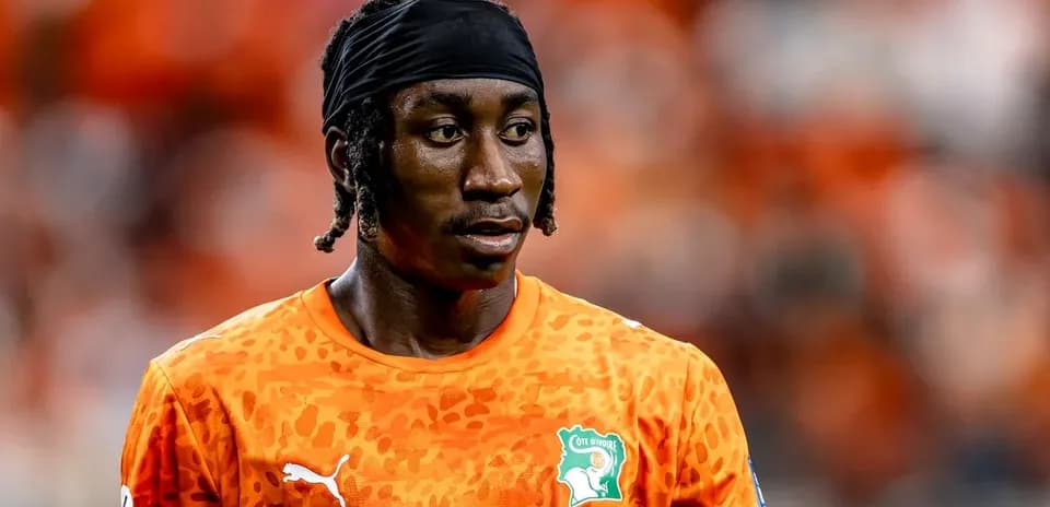 Player wearing orange jersey during a match