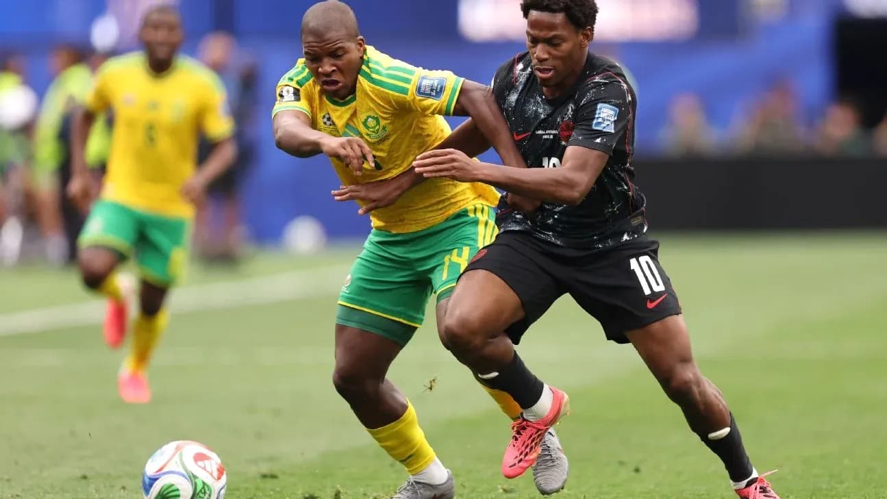 Two players contesting the ball during a match
