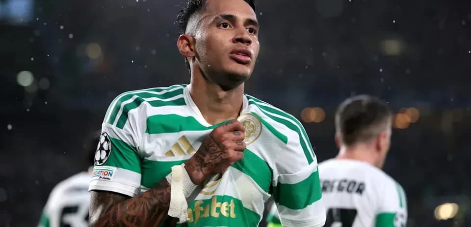 Player celebrating in Celtic FC kit during match
